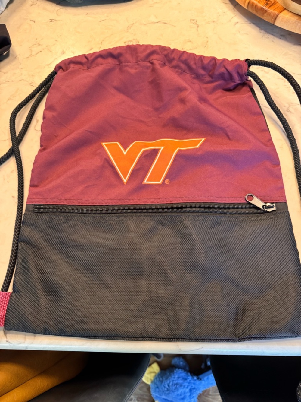 Logo Athletic Maroon and Orange Drawstring Backpack with Black Pocket